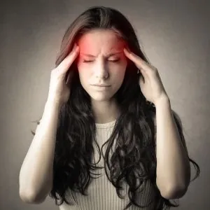 Woman suffering from headache